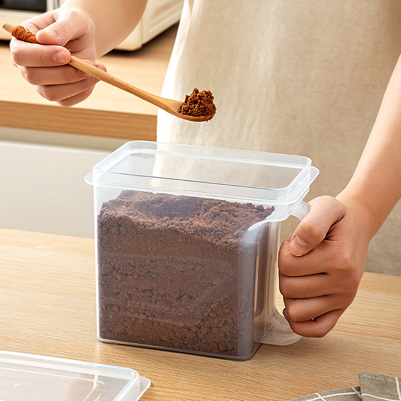 Műanyag téglalap alakú cukortároló edény, lezárható és nedvességálló, mikrohullámú sütőben használható.