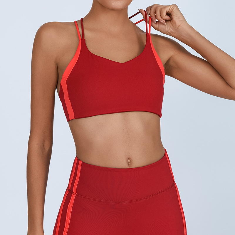Ženski joga top s umetnim jastučićima za prsa, uski kroj, duljina do prsa, visoka elastičnost, brzo suši, odvodi vlagu, materijal nylon-spandex