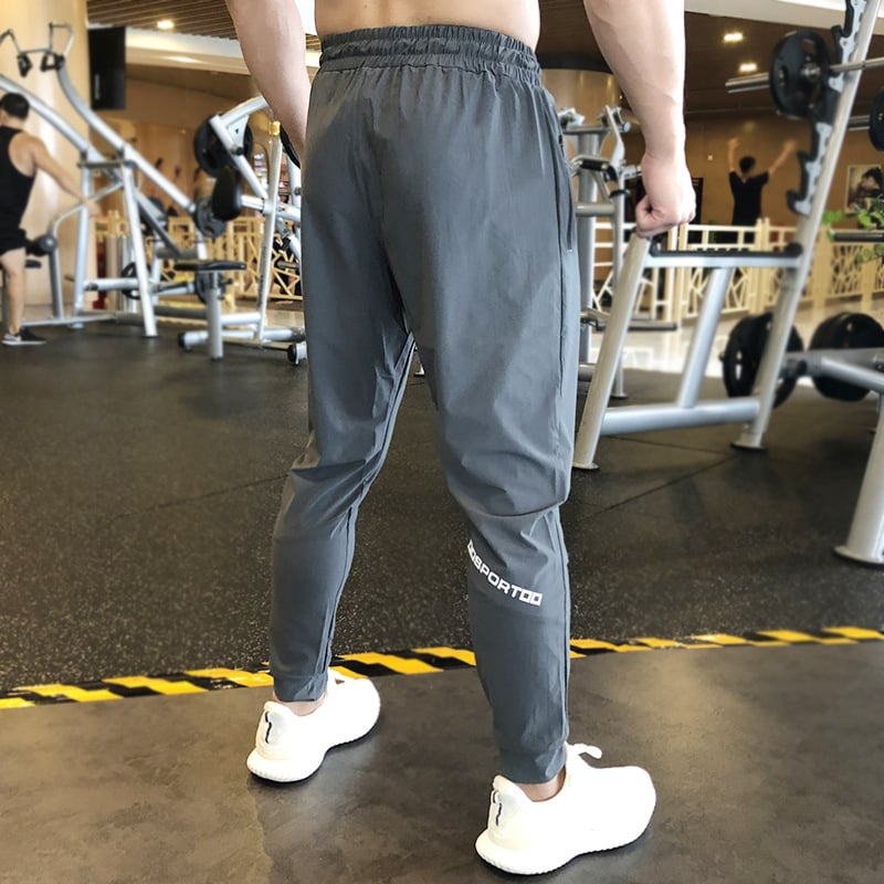 Muške sportske hlače (brzo se suše; odvode vlagu; mješavina kemijskih vlakana; za ljeto, proljeće i jesen; trčanje, fitness, biciklizam)