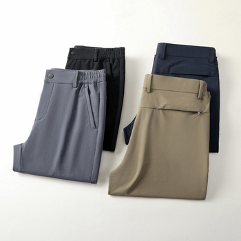 Muške najlon hlače ravnog kroja, poslovno- casual stil, visok struk, zip zatvarač, tanko tkivo, visoka elastičnost