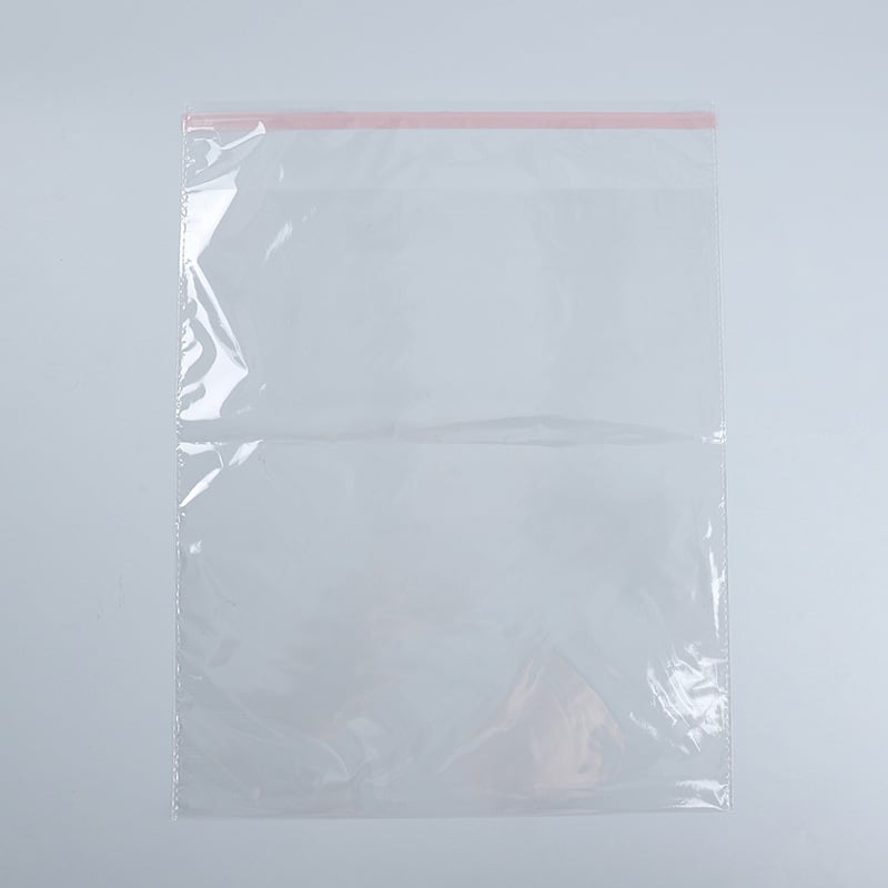 Еднократна хотелска опаковъчна торбичка за кърпи и пантофи — пластмасова, самозалепващо затваряне, без печат на лого