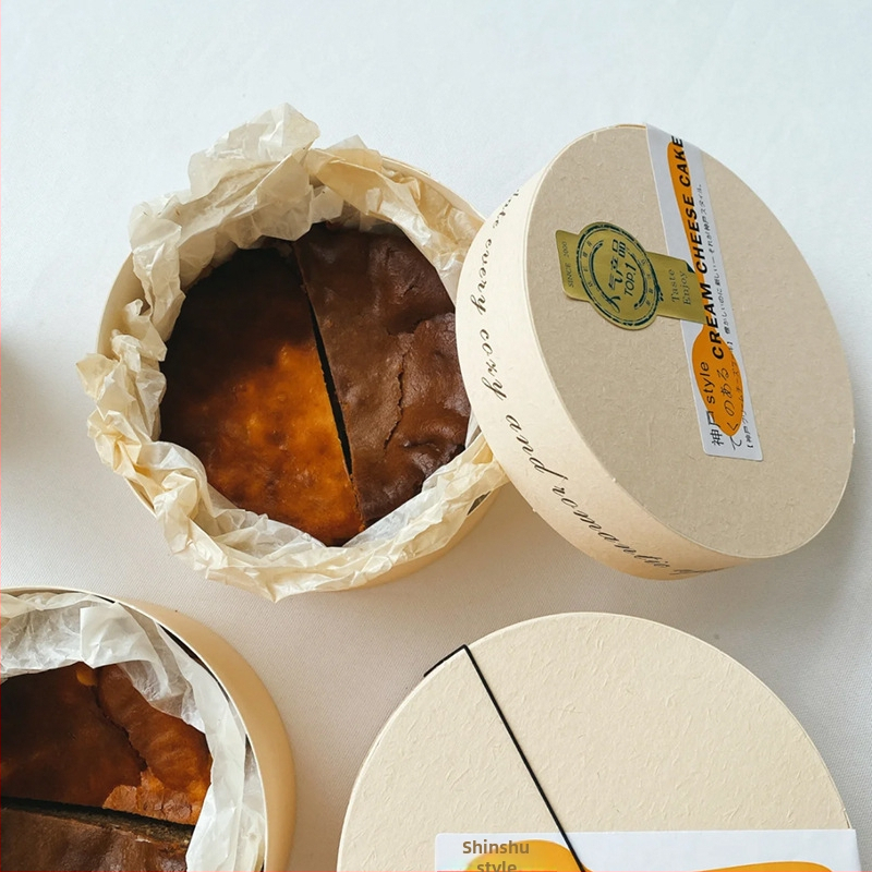 Drevená okrúhla darčeková krabička na pečenie Basque cheesecake a tiramisu — prírodné drevo, vnútorný priestor z potravinárskeho bieleho kartónu, prispôsobiteľné, značka Jiamu, vytlačené logo