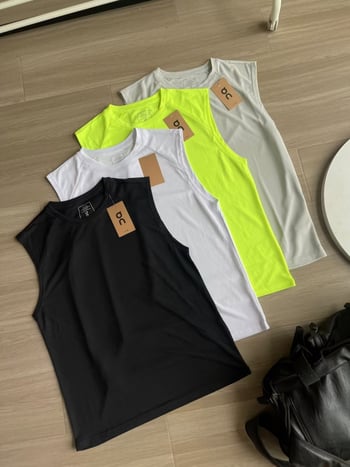 Sportmellény – lazább szabású, ujjatlan, kerek nyakú, gyorsan száradó bambusz rostból készült anyag, vékony anyag, plisírozott zsebek