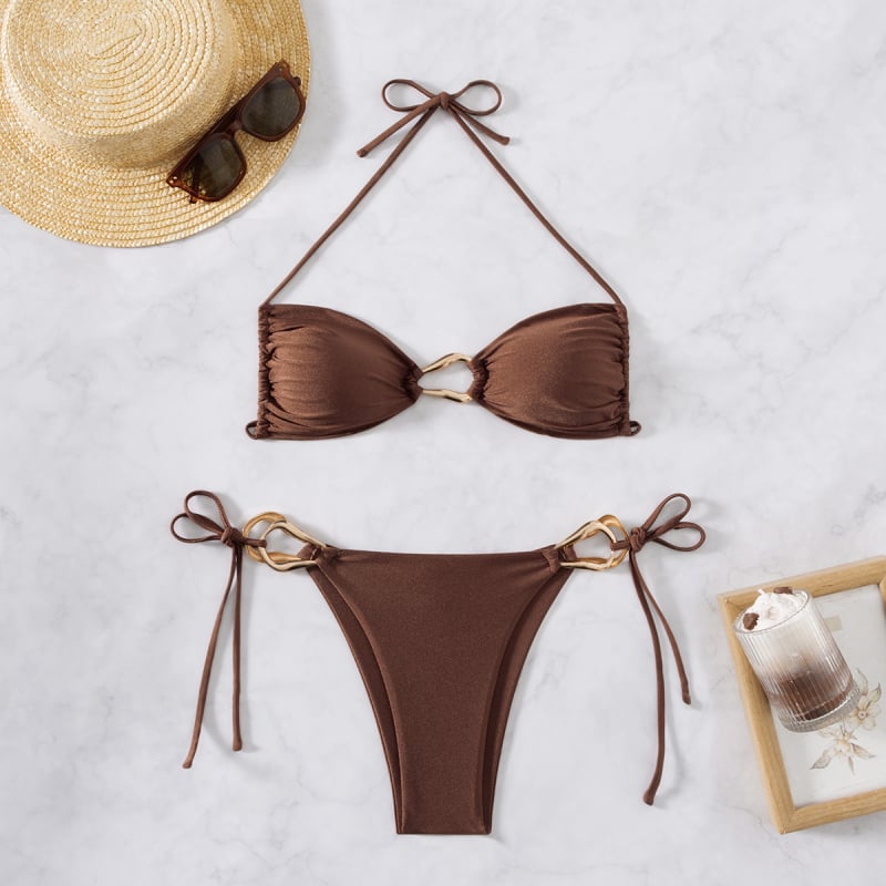 Женски комплект бански бикини с подплънки, горнище безжично и без ръкави; плат 80% полиестер, подплата 20% полипропилен; тегло 120 г