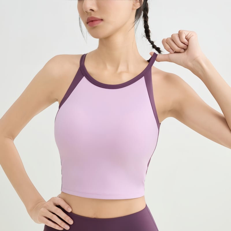 Αθλητικό γιλέκο με ενσωματωμένα κύπελλα, σχέδιο με χρωματικό μπλοκ, σταυρωτό πίσω, υποστήριξη απορρόφησης κραδασμών και απομάκρυνση ιδρώτα, ύφασμα νάιλον/elastan (75/25), κατάλληλο για το τρέξιμο και την προπόνηση.