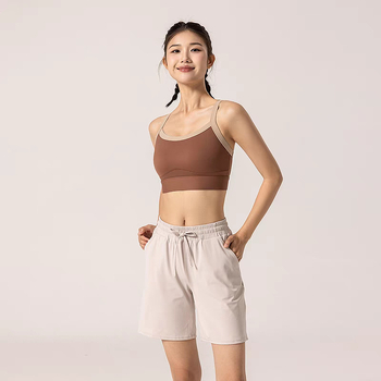 Bezšivni ženski sportski top bez rukava s ugrađenim oblikovanim čašicama, brzo se suši, materijal: 75% najlon, 25% spandex, potpuno punjenje čašica, srednji oblik čašica, fiksni dvostruki naramenici