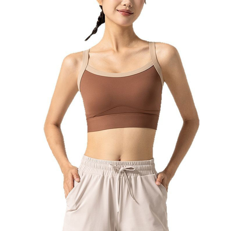 Bezšivni ženski sportski top bez rukava s ugrađenim oblikovanim čašicama, brzo se suši, materijal: 75% najlon, 25% spandex, potpuno punjenje čašica, srednji oblik čašica, fiksni dvostruki naramenici