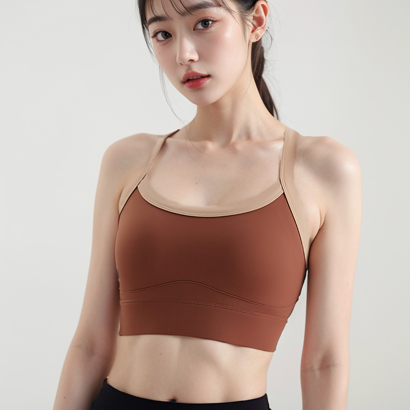 Bezšivni ženski sportski top bez rukava s ugrađenim oblikovanim čašicama, brzo se suši, materijal: 75% najlon, 25% spandex, potpuno punjenje čašica, srednji oblik čašica, fiksni dvostruki naramenici