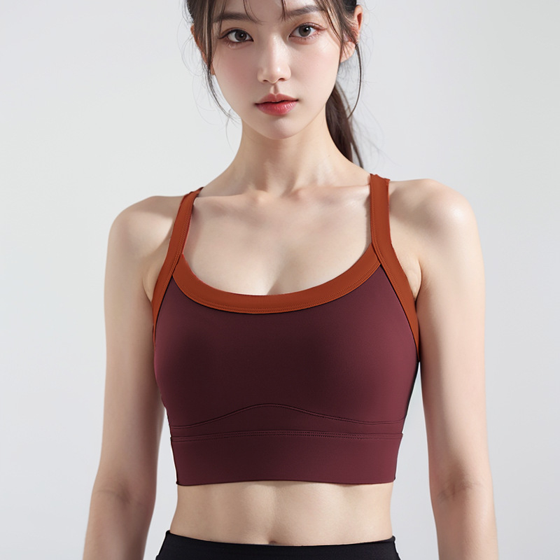 Bezšivni ženski sportski top bez rukava s ugrađenim oblikovanim čašicama, brzo se suši, materijal: 75% najlon, 25% spandex, potpuno punjenje čašica, srednji oblik čašica, fiksni dvostruki naramenici