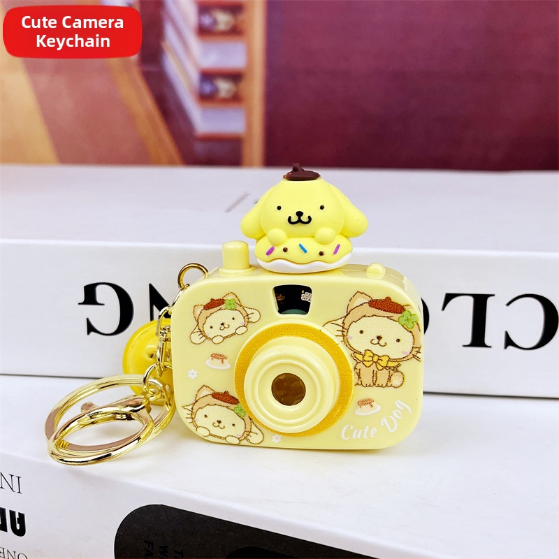 Kljucni lanac s projekcijskom kamerom, svijetleći, slatki crtani stil, plastika, individualno pakirano