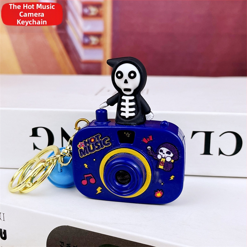 Kljucni lanac s projekcijskom kamerom, svijetleći, slatki crtani stil, plastika, individualno pakirano