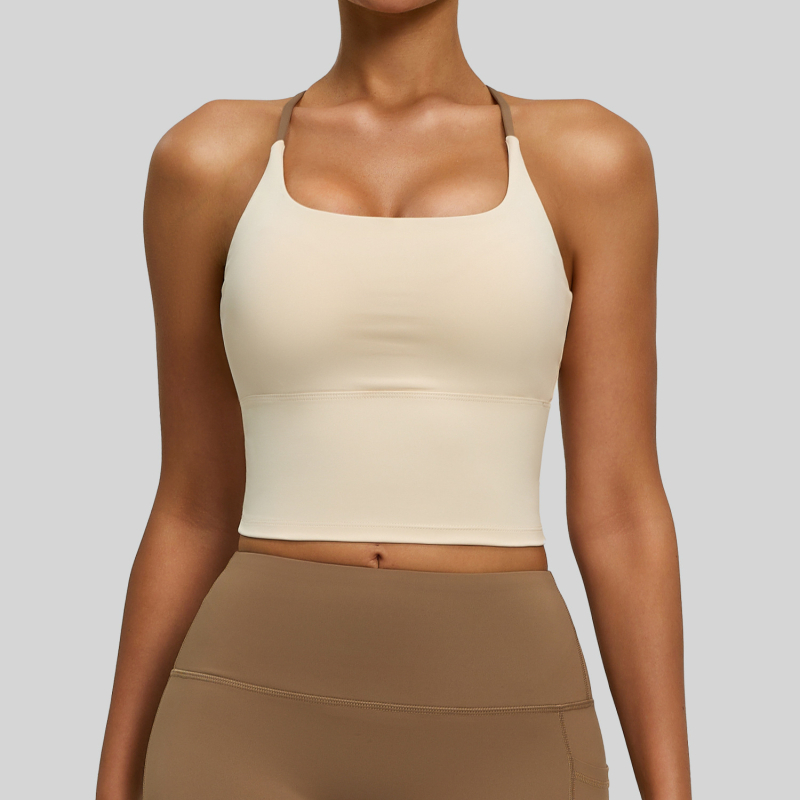 Ženski sportski top s križnim leđnim trakama, s umetkom za grudi, brzo sušeći poliester