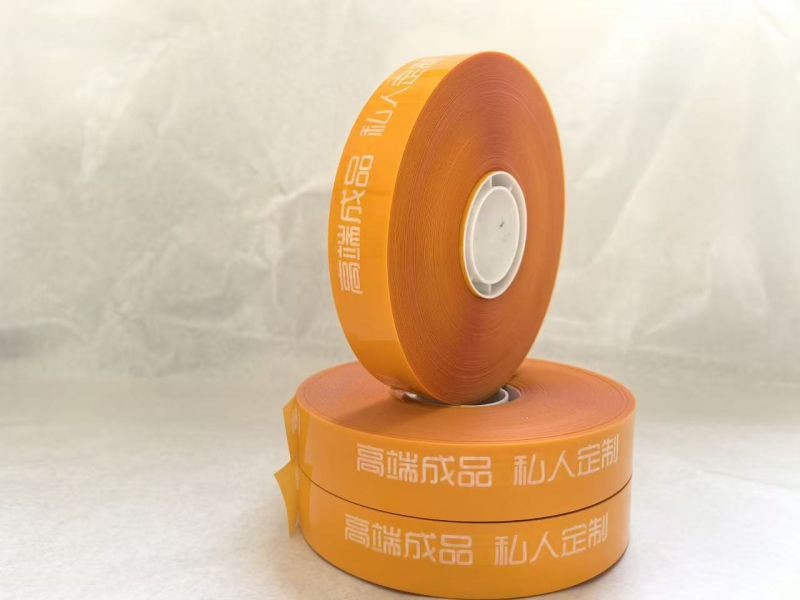 Dvostruka namjenska traka za ambalažu zavjesa, 12 svilenih vlakana, nosivost 20 kg, unutarnji promjer role 406 mm