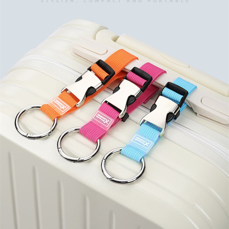 Pojas za prtljagu od webbing materijala, širina 2,5 cm, debljina 1 mm; s funkcijom sprječavanja gubitka; za putovanja i poslovna putovanja; mogućnost prilagodbe