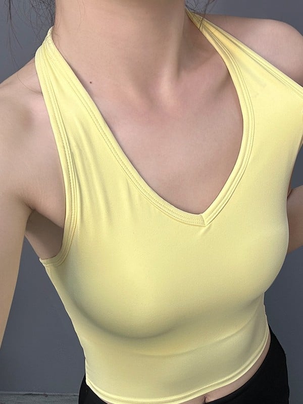 Τοπ χωρίς μανίκια για άθληση – γυναικείος τοπ γιόγκα με ενιαία cup, ανοιχτή πλάτη και halter λαιμού • Ύφασμα 80% νάιλον, 20% σπαντέξ • Κωδ. A35 • Για τρέξιμο, ποδηλασία