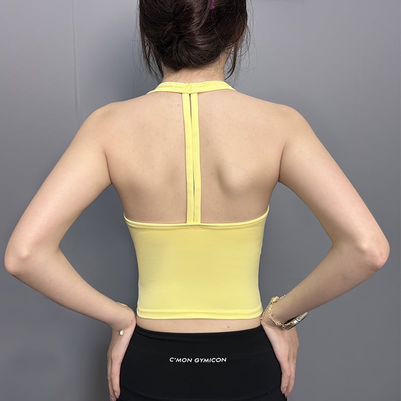 Τοπ χωρίς μανίκια για άθληση – γυναικείος τοπ γιόγκα με ενιαία cup, ανοιχτή πλάτη και halter λαιμού • Ύφασμα 80% νάιλον, 20% σπαντέξ • Κωδ. A35 • Για τρέξιμο, ποδηλασία