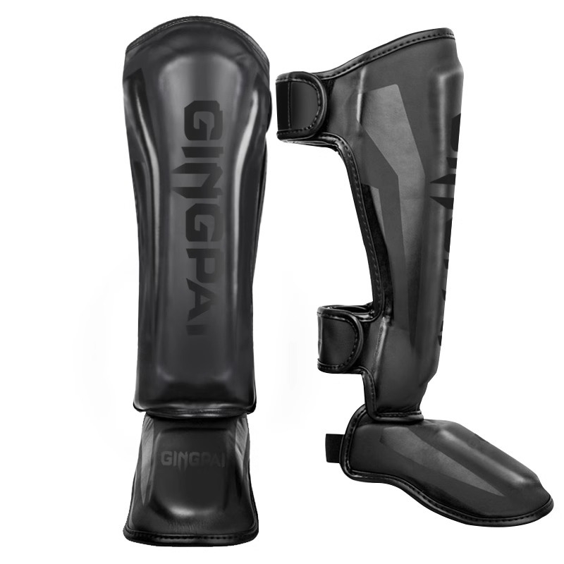 Muay Thai štitnik za potkoljenicu PU vertikalnog dizajna, model fangs leggings, težina 0.5