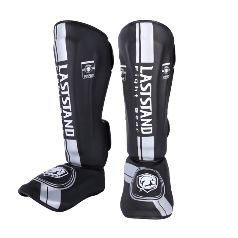 Muay Thai štitnik za potkoljenicu PU vertikalnog dizajna, model fangs leggings, težina 0.5