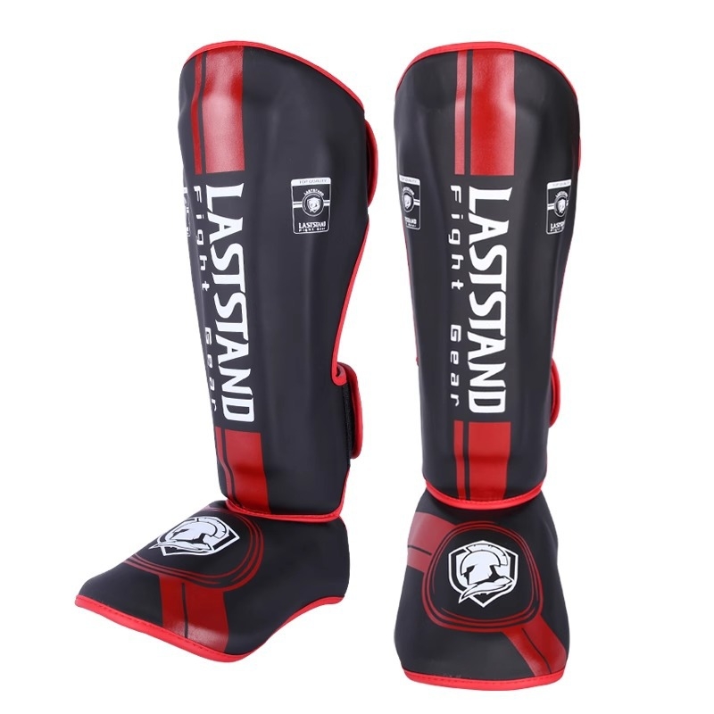 Muay Thai štitnik za potkoljenicu PU vertikalnog dizajna, model fangs leggings, težina 0.5