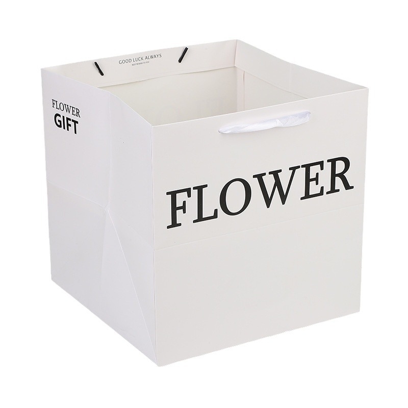 Kvadratna tote torba s floralnim uzorkom; podrijetlo Yiwu; tehnike: tisak, toplinsko pečatiranje, laminiranje, udubljenje; materijal bijeli karton; moguć ispis logotipa.
