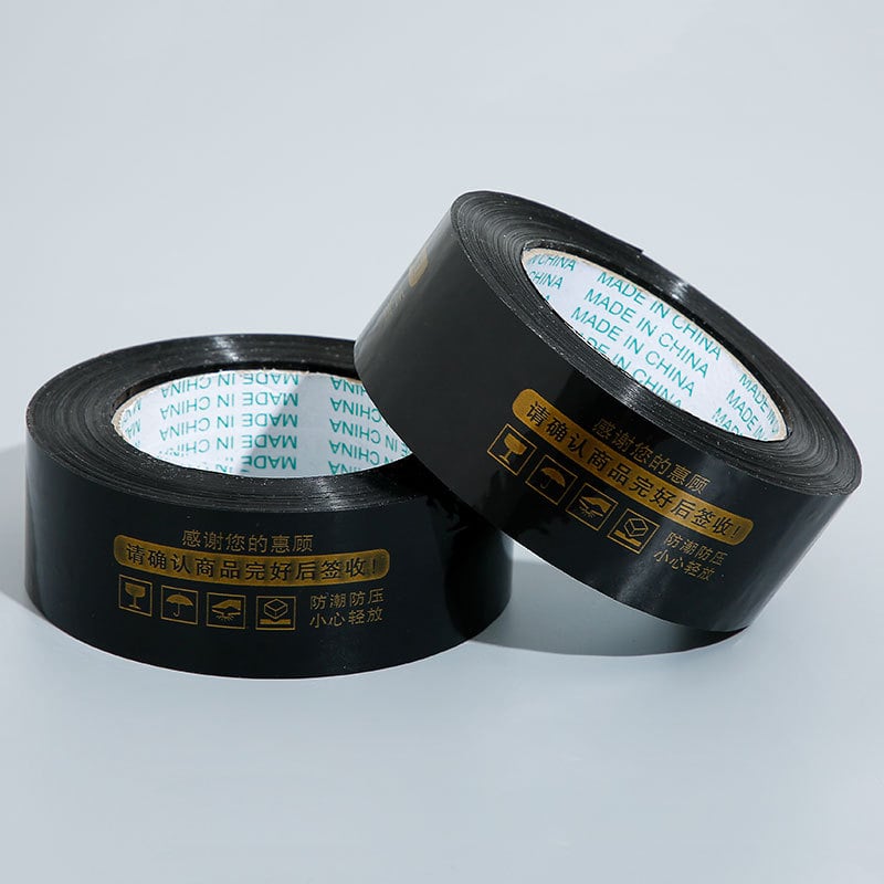 Лента за запечатване на кутии с предупредителен текст, BOPP филм, 60 μm, лепило на водна основа, разкъсване с инструмент, 0–60°C, подходяща за електронна търговия и складово опаковане