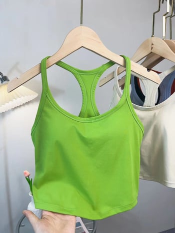 Ženski sportski top za jogu s fiksnim košaricama, otporan na udarce, oblikujući potporu, brzo se suši, kratka duljina