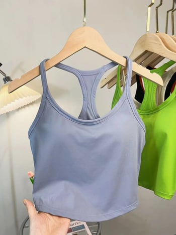 Ženski sportski top za jogu s fiksnim košaricama, otporan na udarce, oblikujući potporu, brzo se suši, kratka duljina