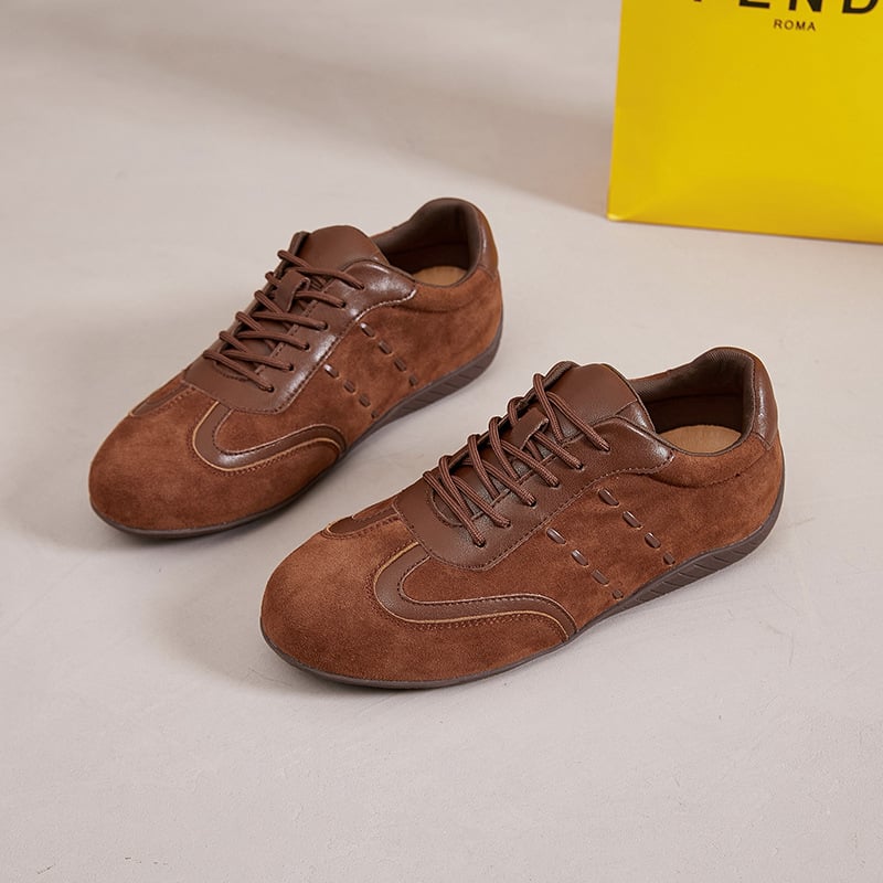 Ženske svakodnevne ravne tenisice s okruglim nosom, gornji dio od split kože, gumeni potplat, vezanje sprijeda, niski profil