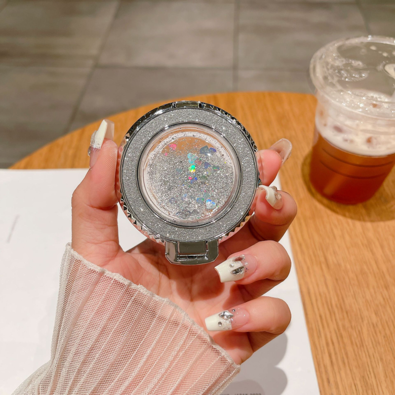 Suport pentru telefon cu inel metalic, autocolant pe spate cu efect nisip, stand de birou portabil — Personalizare disponibilă