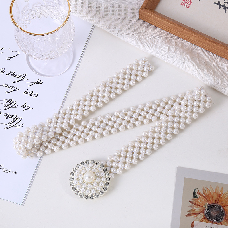 Pojasni lanac s perlama – metalna konstrukcija, svestran stil, duljina 60–80 cm, širina 3,5 cm