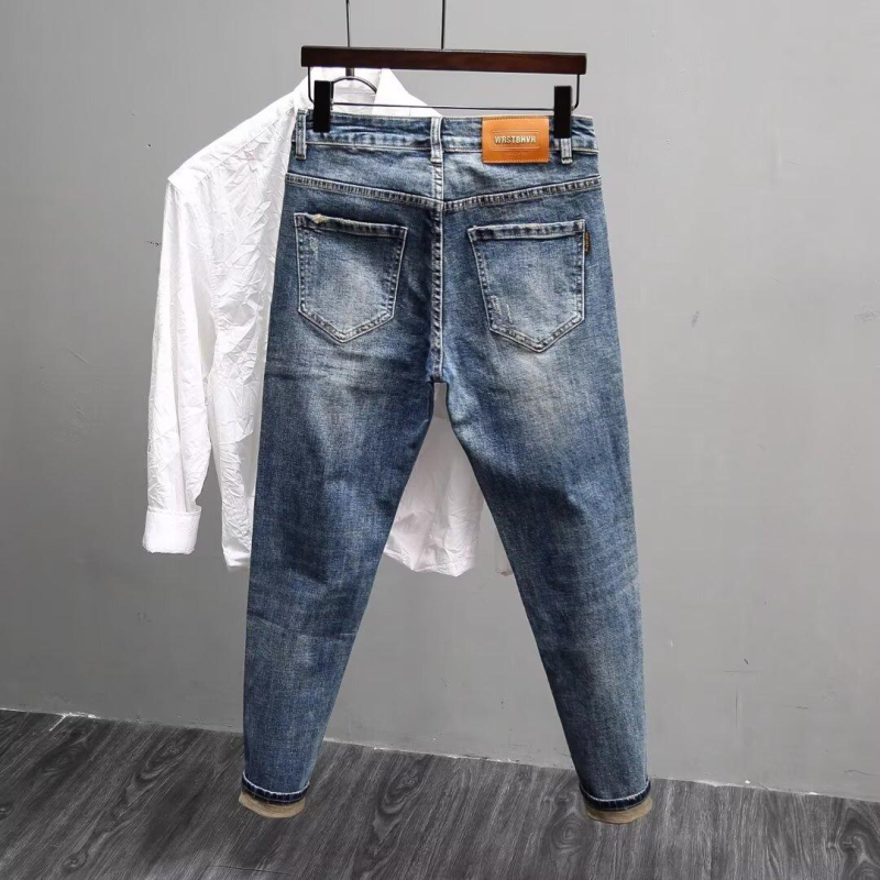 Muške traperice slim-fit, suženi kroj, oprani denim, srednji pojas, kopčanje na gumbe