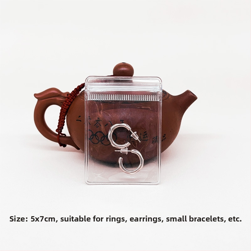 Priehľadná PVC uzatváracia taška na skladovanie náramkov a šperkov, zosilnený anti-oxidantný PVC materiál, dĺžka uzatvárania 1–1,5 cm, pôvod: Wenzhou, Zhejiang