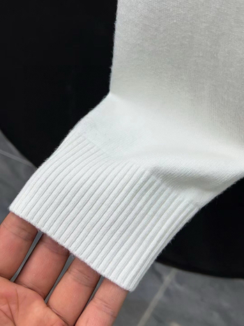 Kardigan od kamel vlakna (30-35%), jacquard uzorak, okrugli ovratnik, uski kroj