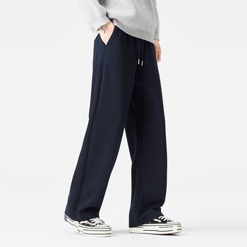 Pantaloni trening largi cu șnur în talie, croială dreaptă, amestec bumbac-poliester (68.9% bumbac, 31.1% poliester), iarna 2025, ținută sport