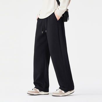 Pantaloni trening largi cu șnur în talie, croială dreaptă, amestec bumbac-poliester (68.9% bumbac, 31.1% poliester), iarna 2025, ținută sport