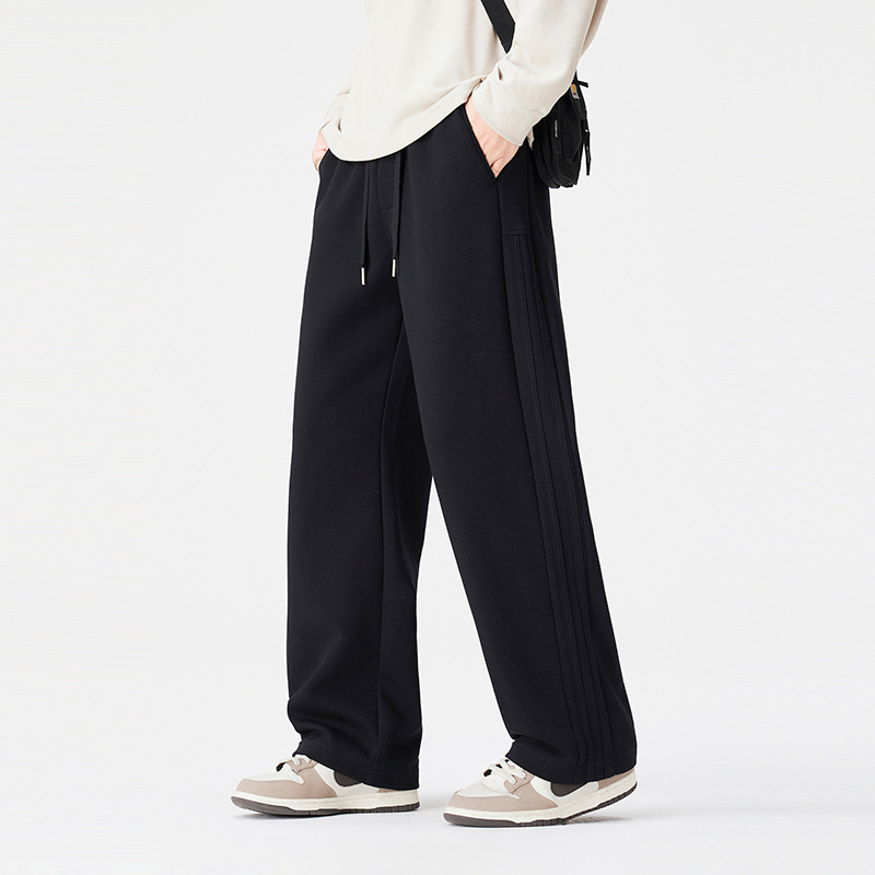 Pantaloni trening largi cu șnur în talie, croială dreaptă, amestec bumbac-poliester (68.9% bumbac, 31.1% poliester), iarna 2025, ținută sport