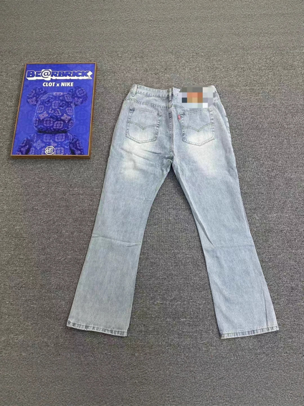 Traperice srednje visine, mikro-flaired ravni kroj, oprani završetak, pamuk denim, rajfesluz