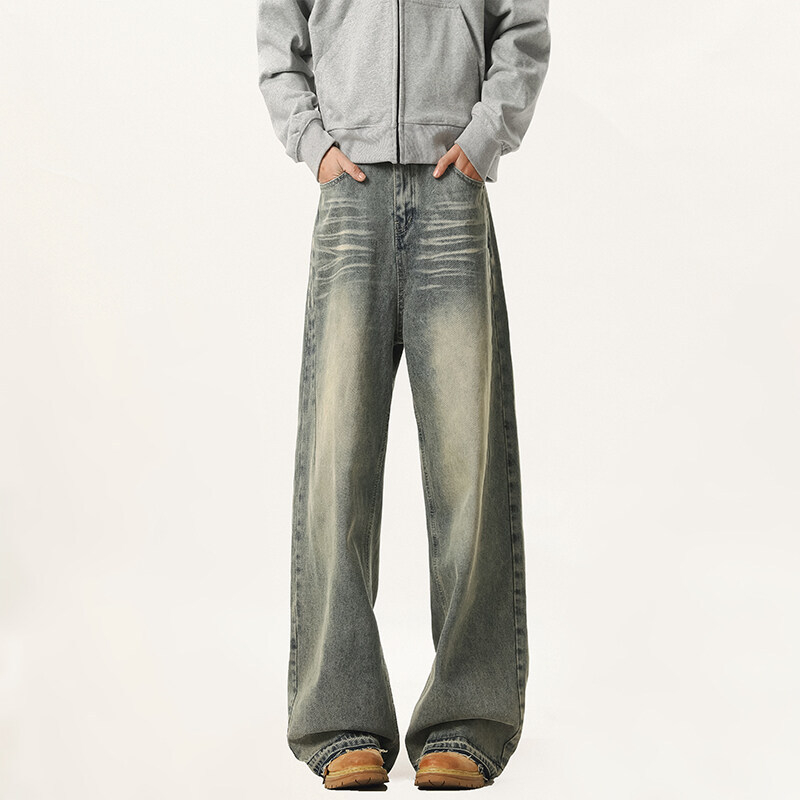 Jeans od denima s distres efektom, ravni kroj s širokim nogavicama, srednji porast struka, zip, 60% pamuka