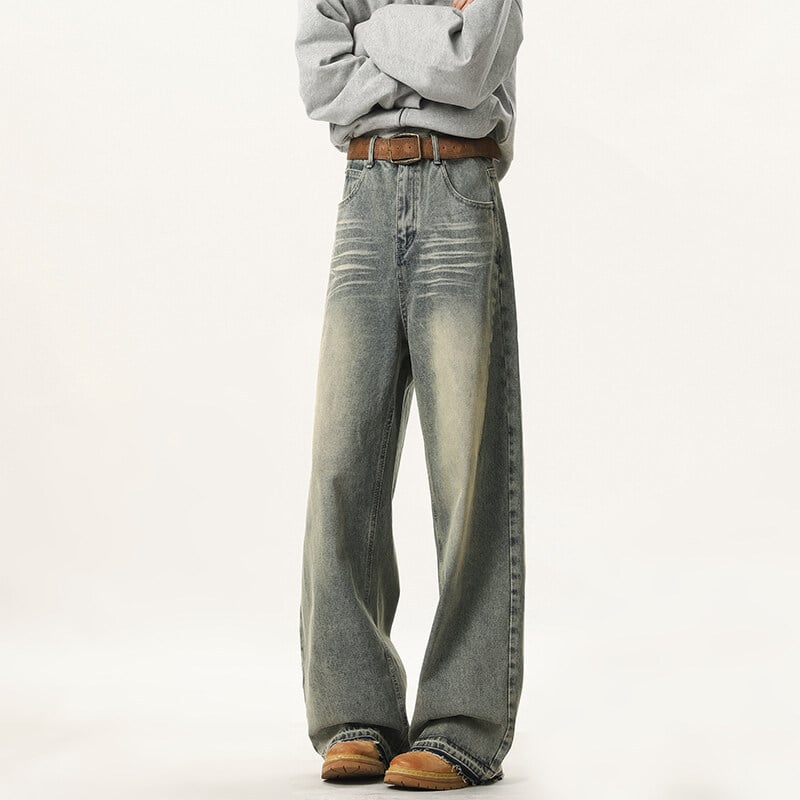Jeans od denima s distres efektom, ravni kroj s širokim nogavicama, srednji porast struka, zip, 60% pamuka