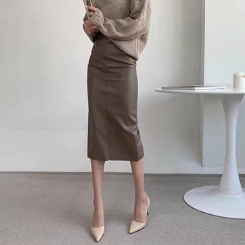 Suknja s stražnjim prorezom, visokim strukom, srednje duljine, gradski elegantan stil, zatvarač i šivanje