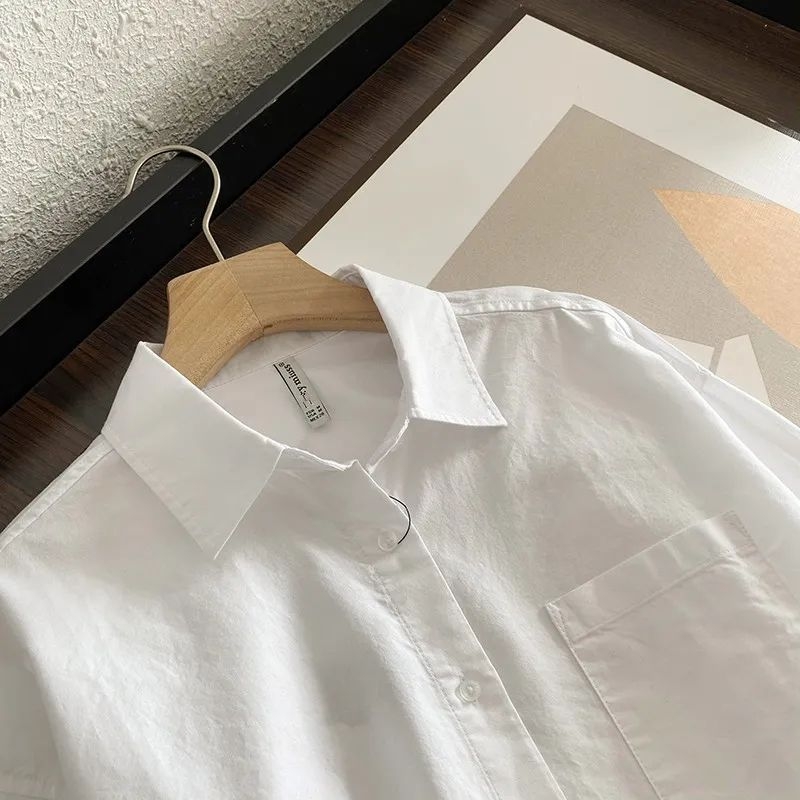 Košulja od tkanine cloud yarn, polo ovratnik, bez rukava, kopčanje u jednom redu, iluzija dvodijelnog kompleta