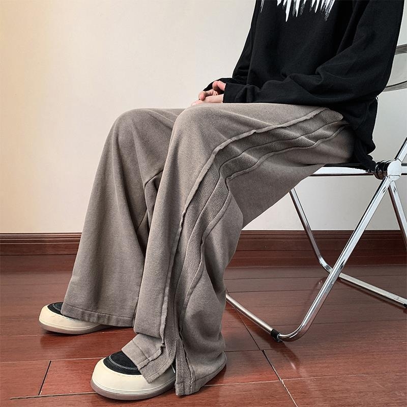 Muške jesenske casual hlače, opuštenog širokog kroja, srednji pojas, kopčanje sa šnuranjem, poliester smjesa