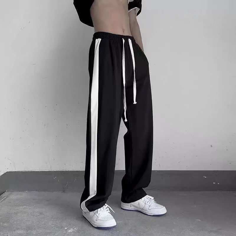 Muške casual hlače u korejskom stilu, široke i udobne, do gležnja, srednji pojas, bez pojasa, s vezicom za podešavanje, prugasti uzorak, poliester.