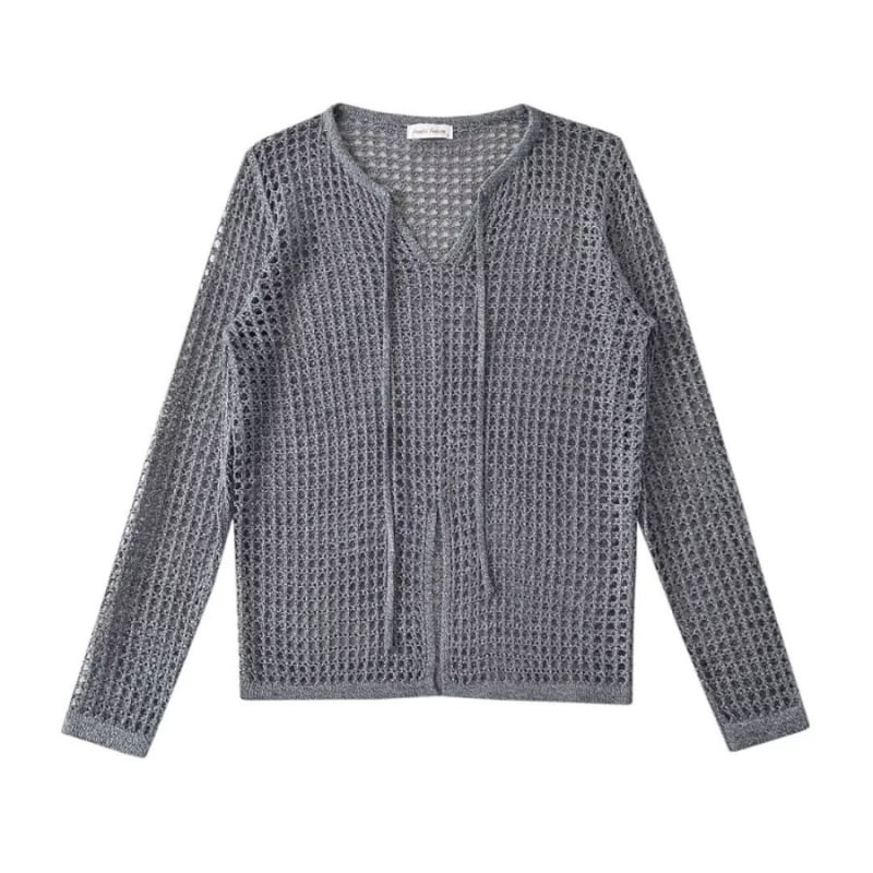 Pulover: Labav pulover od pamukovog vlakna, s perforacijama, slobodan kroj, dugi rukavi, okrugli izrez