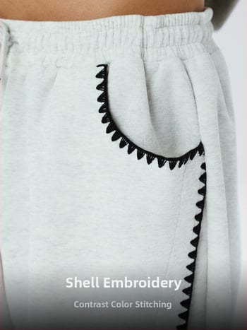 Jesensko izdanje 2025: dekonstrukcijski kroj, shell izšivanje, color-blocking, ravni kroj.