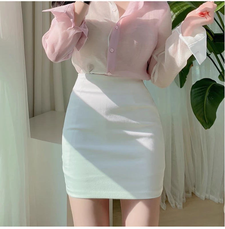 Visoko podignuta bodycon suknja, pamuk-elastan smjesa, elastična, uredski stil, ljeto 2025
