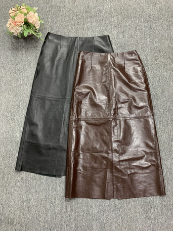Suknja od kozje kože, visok pojas, srednja duljina, ravni kroj s otvorom, vintage uredski stil, jesen 2024