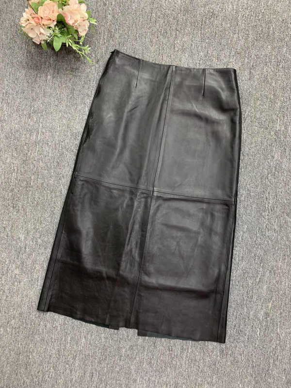 Suknja od kozje kože, visok pojas, srednja duljina, ravni kroj s otvorom, vintage uredski stil, jesen 2024
