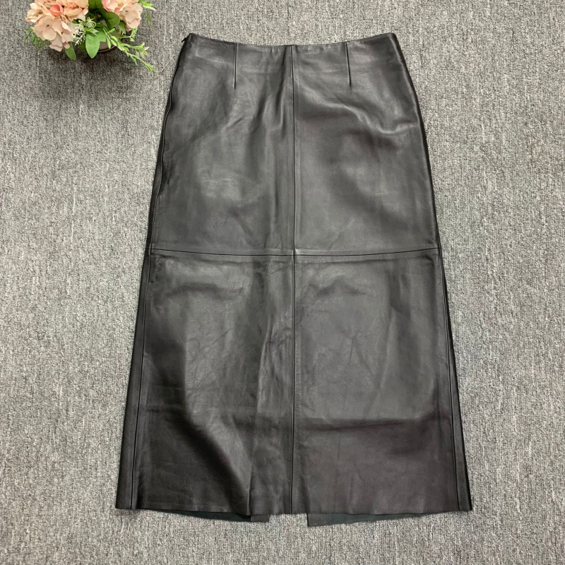 Suknja od kozje kože, visok pojas, srednja duljina, ravni kroj s otvorom, vintage uredski stil, jesen 2024