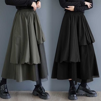 Mrežasta suknja s nepravilnim krojem, srednja duljina, uredski stil